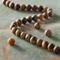 12 Packs: 32 ct. (384 total) Brown Matte Tiger's Eye Round Beads, 8mm by Bead Landing™